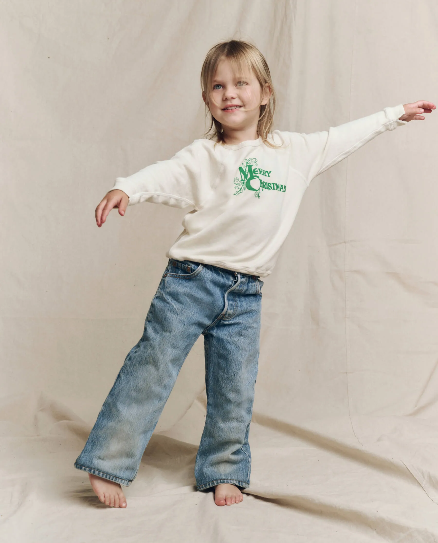 The Little College Sweatshirt. Graphic -- Washed White with Merry Christmas Graphic