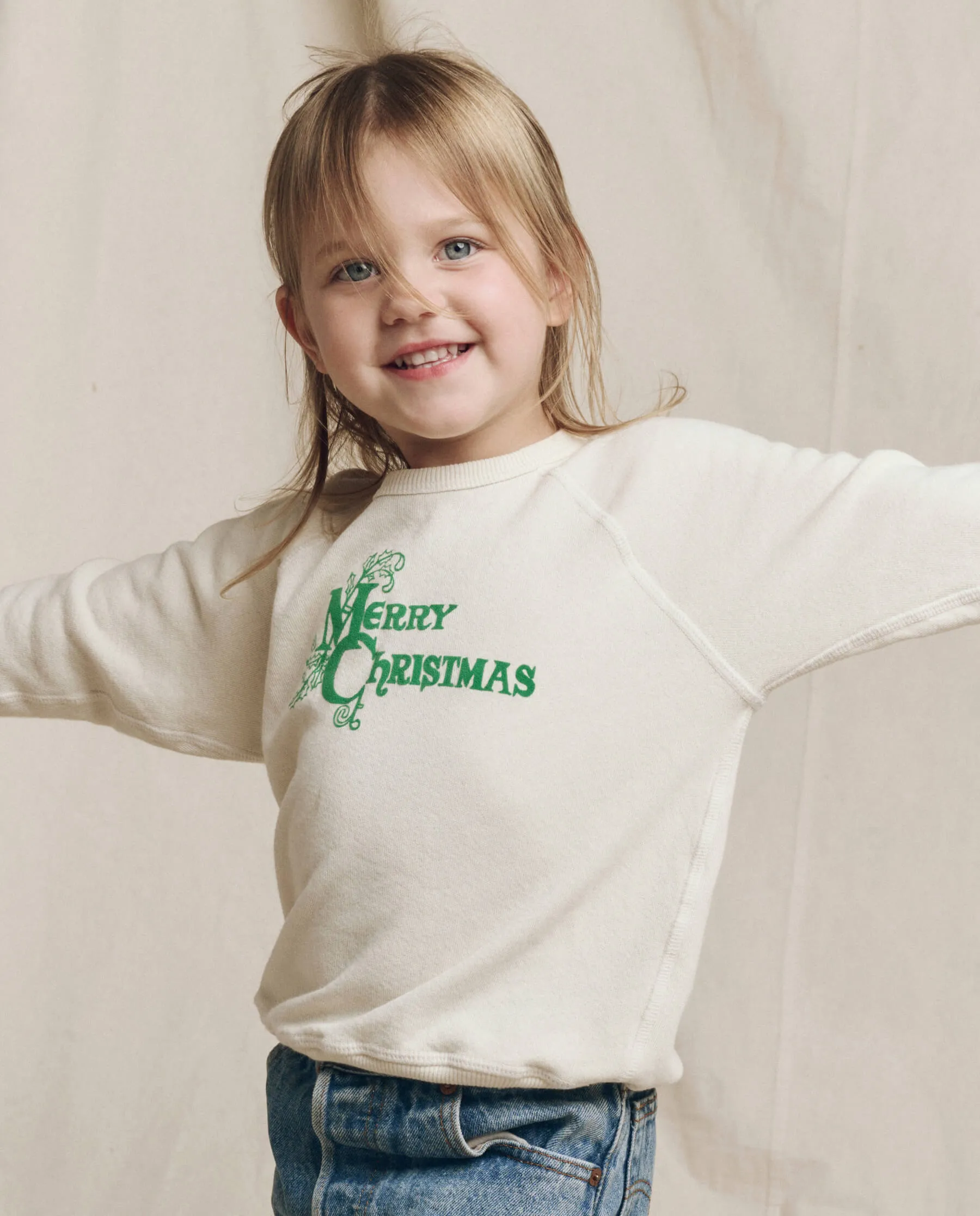 The Little College Sweatshirt. Graphic -- Washed White with Merry Christmas Graphic